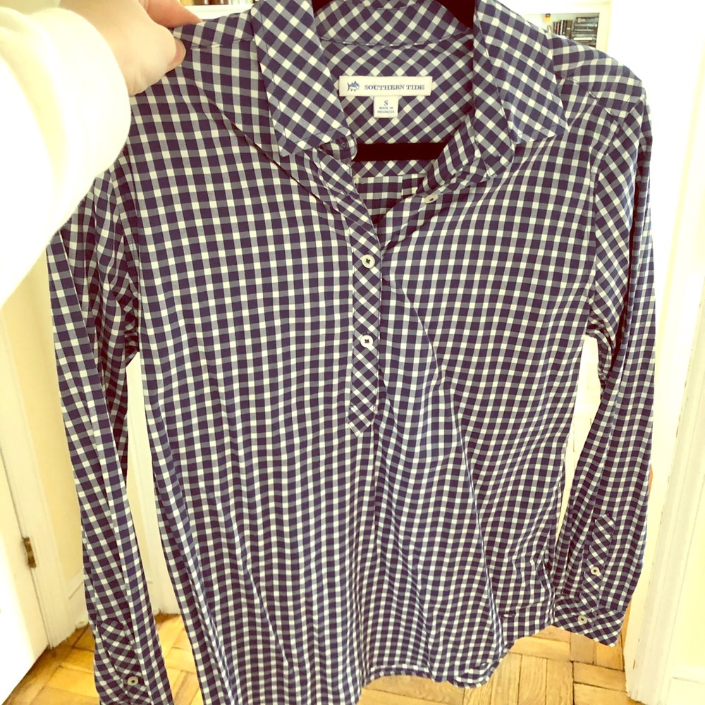 Collared quarter-button up shirt. Never worn.